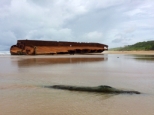 Freighter torn violently in half - lengthwise